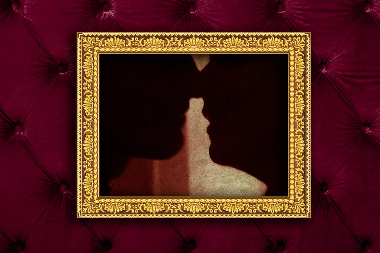 A photo of two men about to kiss in an ornate frame.